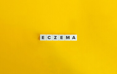 Eczema Word on Letter Tiles on Yellow Background. Minimal Aesthetics.