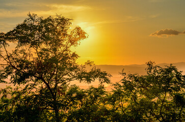 Sunset views with orange sky, from the town of Cortona, Arezzo, Tuscany