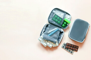 Daily medicine chest, container of pills, tablets, vitamins, travel first aid kit. pill box dispenser medications, nutritional supplements. medical treatment for disease virus dosage of medicine