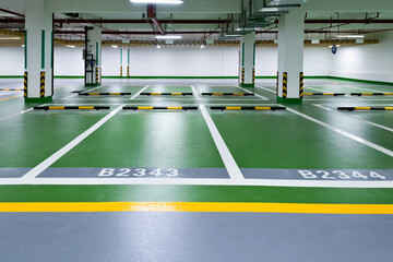 Empty underground parking lot in modern building