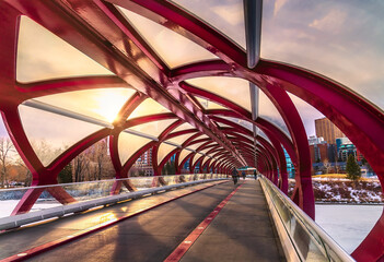 Sun Glowing Over The Peace Bridge Walkway - obrazy, fototapety, plakaty