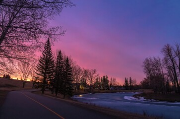 Fototapeta na wymiar Sunrise Over A Spring Park Path