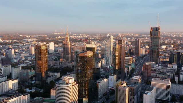 Aerial panoramic footage of downtown. Modern high rise office buildings towering above urban development. Warsaw, Poland