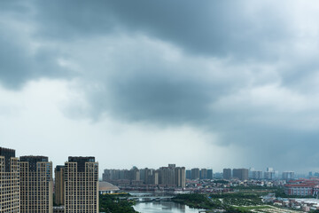 Storm clouds over the city buildings