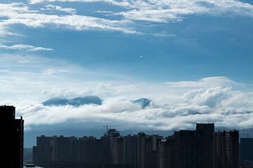 Fototapeta premium Unfinished buildings under cloud sky
