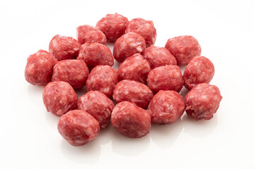 Raw meatballs isolated on white background. High angle and copy space