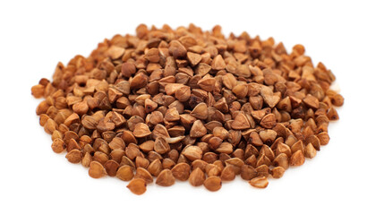 A bunch of buckwheat on a white background. Natural healthy food, vegan diet. Buckwheat groats closeup isolate