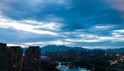 Fototapeta premium Dark blue cloud over the city