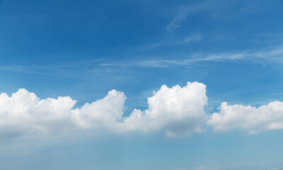 White clouds are in the blue sky