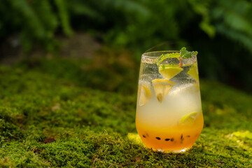 Mango passionfruit margarita cocktail with lime. Tropical alcoholic drink for summer 