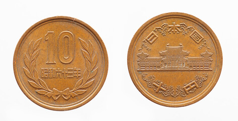 Japan - circa 1964: a 10 yen coin of Japan showing a historic building with Japanese characters