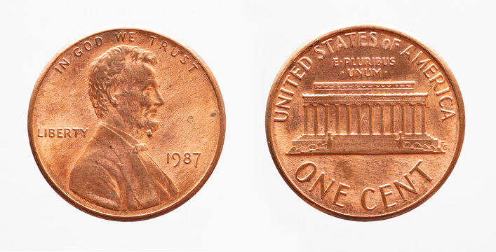 USA - circa 1987: a USA one cent coin showing the portrait of President Abraham Lincoln and the Lincoln Memorial building. Text: In god we trust