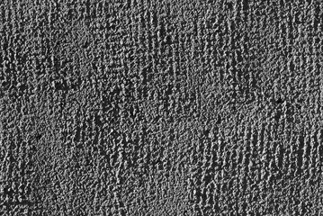 gray background. in the photo, gray decorative plaster on the wall.