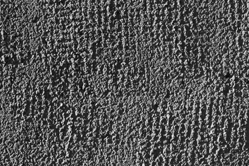 gray background. in the photo, gray decorative plaster on the wall.