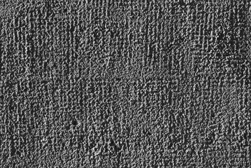 Fototapeta premium gray background. in the photo, gray decorative plaster on the wall.