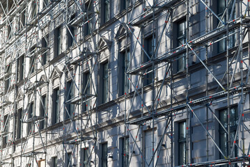 the facade of the building, the restoration work of the building in the photo, the scaffolding is also visible in the photo/
