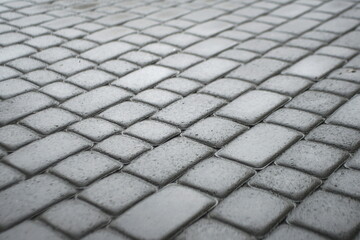wet gray cobblestone background texture 