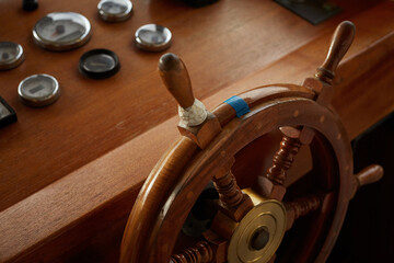 close up of a nautical steering wheel