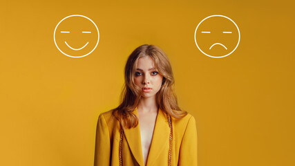 Girl teenager close-up on a yellow bright background with emotions, the choice between positive or...