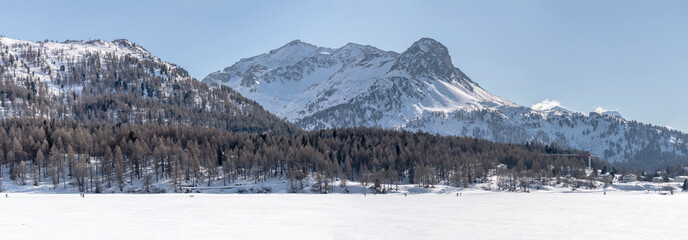 Fototapeta na wymiar piz Bacun and frozen lake, near Maloja, Switzerland