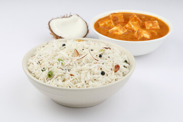 Coconut Rice - South Indian recipe using leftover cooked Basmati rice, served in a red bowl 