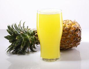Pineapple fresh juice in glass with pineapple