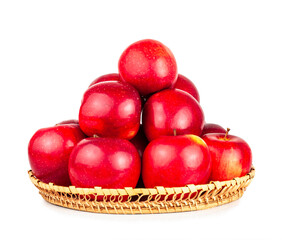 Red apple basket isolated on a white background