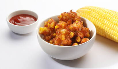 Crispy Corn pakora/pakoda, bhajji, Bhaji, bajji or pattice . served with tomato ketchup