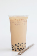 A glass ice milk tea Taiwan style fresh drink on white background