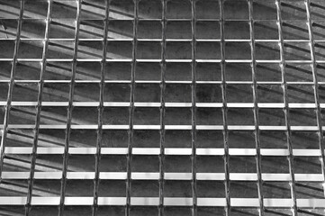 gray background, in the photo,metal lattice flooring.