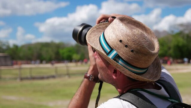Tourist man visit Chichen Itza is a large pre-Columbian city built by the Maya people which has Mesoamerican Pyramids. The archeological site is located in Tin&uacute;m Municipality, Yucat&aacute;n State, Mexico.