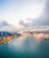 Fototapeta na wymiar Epic Aerial view of Victoria Harbour, focus on the East side of Hong Kong Island