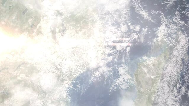 Earth zoom in from outer space to city. Zooming on Nampula, Mozambique. The animation continues by zoom out through clouds and atmosphere into space. Images from NASA