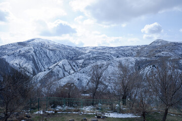 view of the mountain peaks in early spring