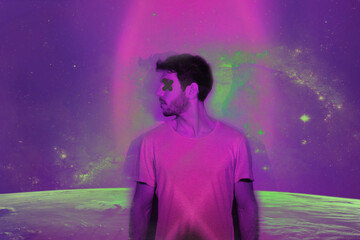 Young man in profile on colorful galaxy lights	background