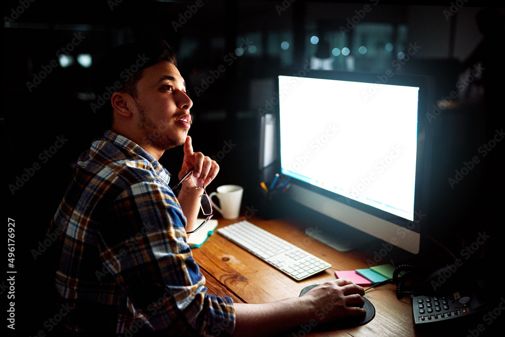 Aufkleber great ideas can come at any time. shot of a young male designer deep in thought whhile working on hi