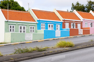 Small colorful houses along the road somewhere in Willemstad, Curacao