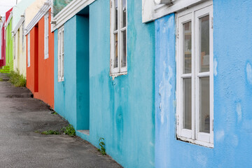 Small colorful houses along the road somewhere in Willemstad, Curacao