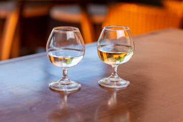 Two glasses of tequila.