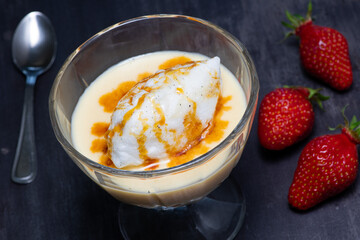 Snowy eggs and custard recipe on black background
