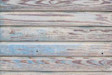 background: wooden planks in blueish, brownish and greenish colors