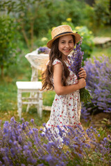 Beautiful long hair girl near lavender bushes