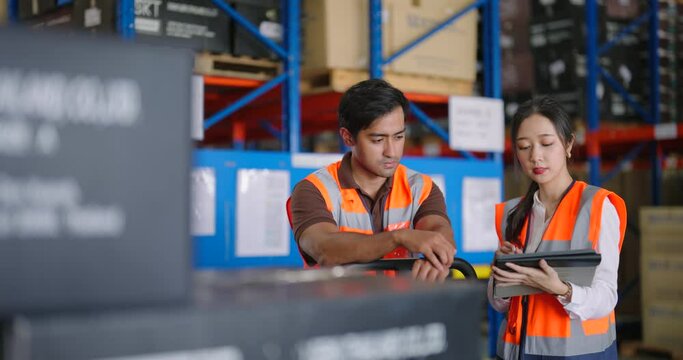Warehouse workers discussing shipping schedule. logistic and business export concept.