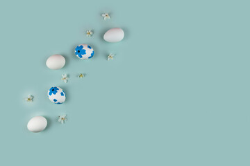 Easter eggs decorated with flowers and cherry blossoms
