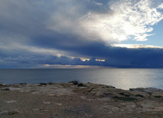 the seashore and reflexes from the island and rocks