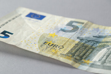5 euro banknote close-up. Soft focus