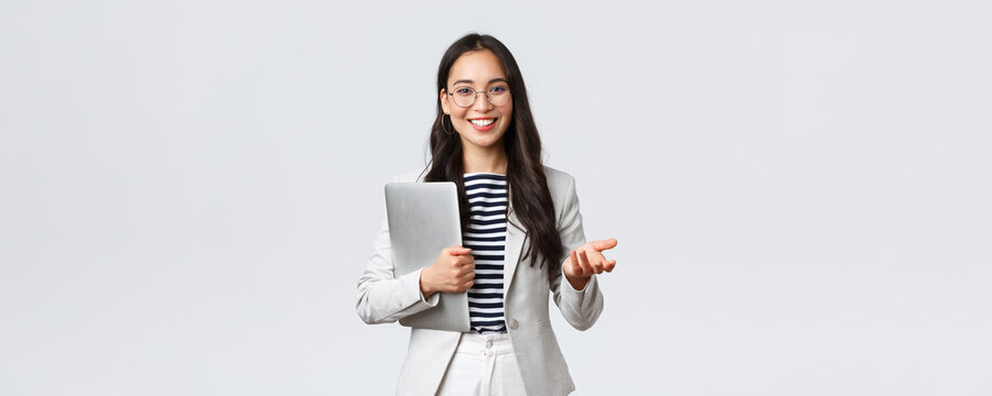 Business, Finance And Employment, Female Successful Entrepreneurs Concept. Smiling Professional Businesswoman, Real Estate Broker Showing Clients Good Deal, Carry Laptop In Hand