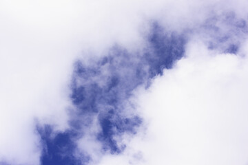 Section of the blue sky and clouds.