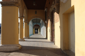 A beautiful colonnade in the Plaza Vieja in Havana, Cuba