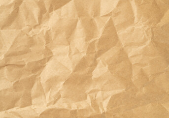 Wrinkled sheet of brown paper. Textured backdrop
